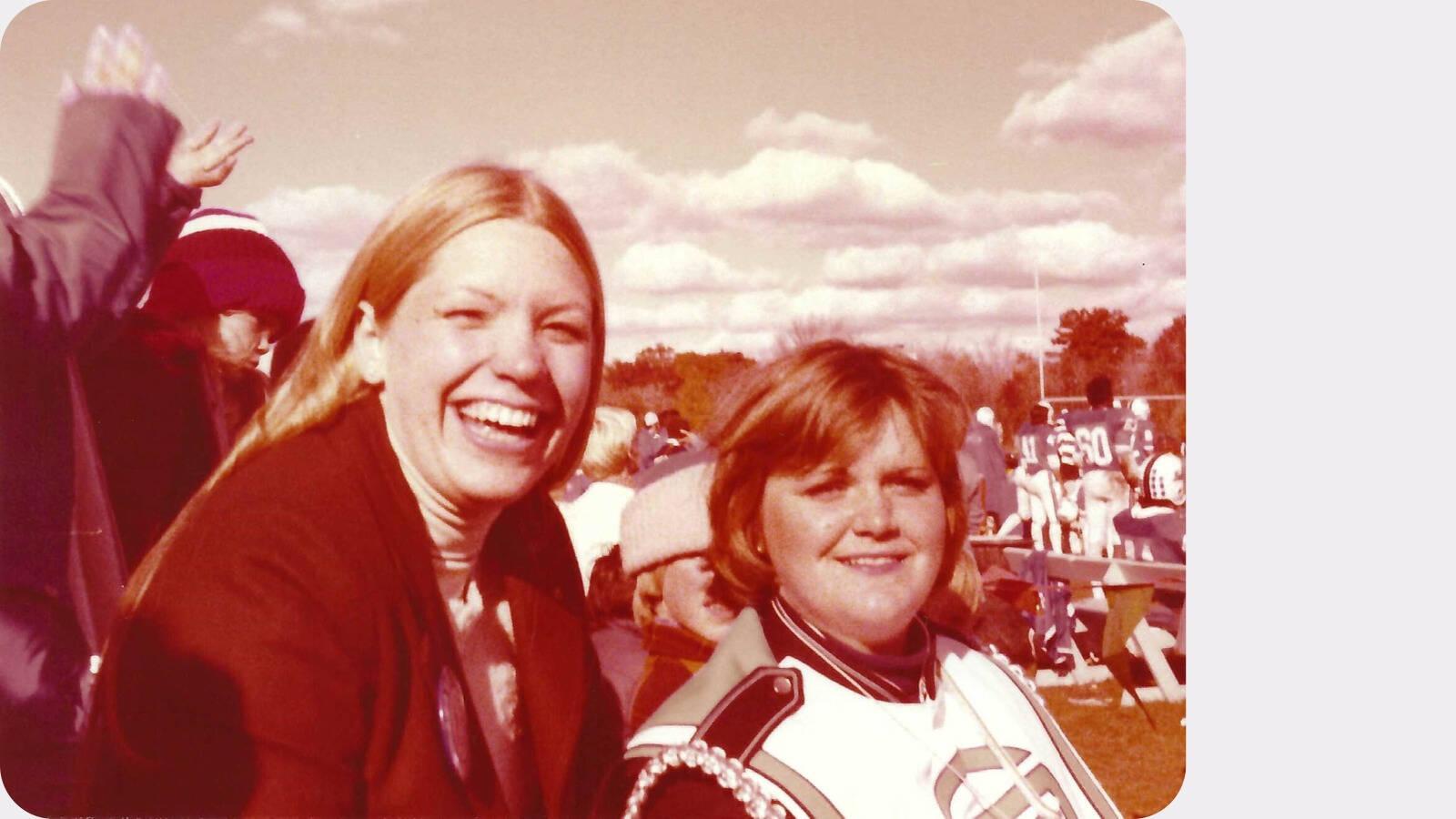 Maris Timmer Tracy ’78, left, and Kathleen (Ure) Bell ’81 are pictured at Homecoming 1978, prior to receiving their prizes for the Lyrics Contest.